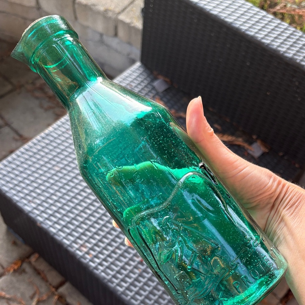 The Milk Protector Green Glass Bottle with Cork “Absolutely Pure Milk”imprint